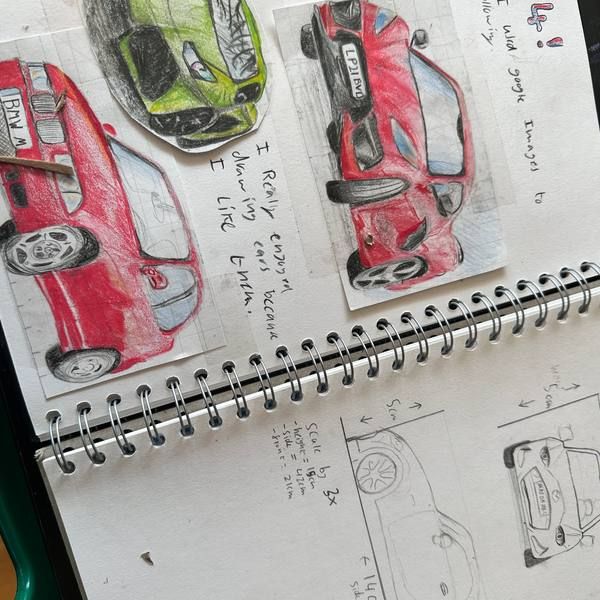 Sketchbook study of red sports cars