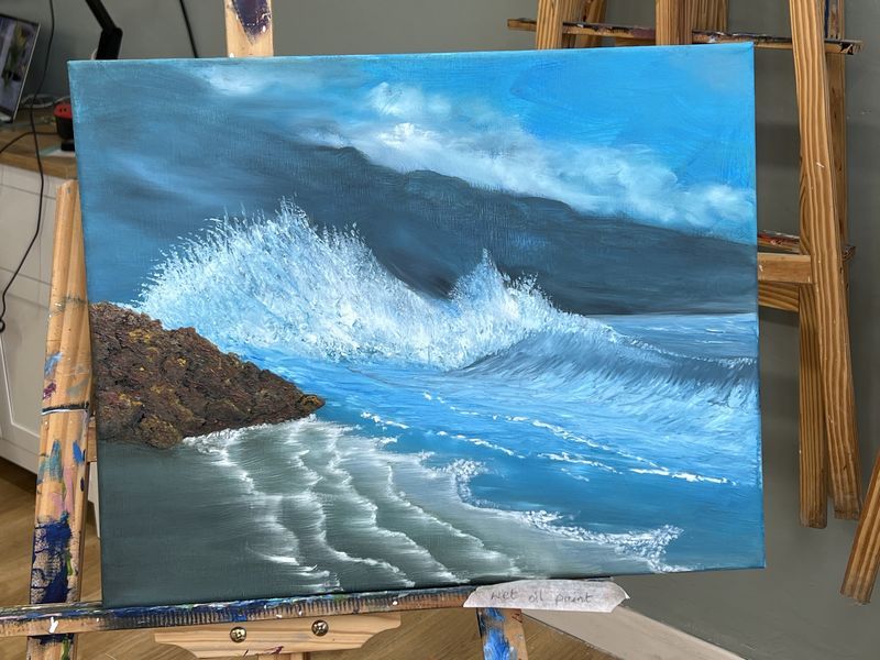 Acrylic painting of a white-crested wave crashing onto rocks